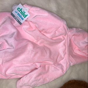 Pink fuzzy infant winter body suit